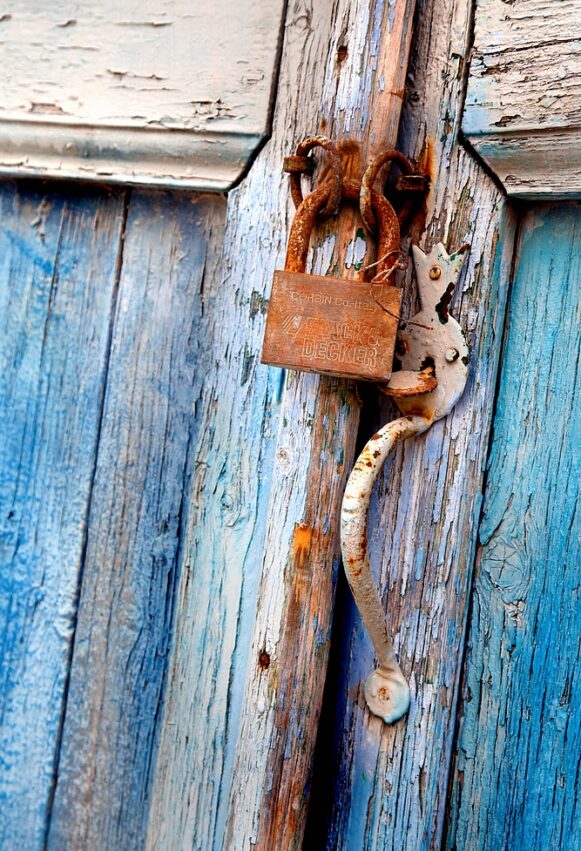 Old blue door with lock